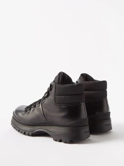 prada brixxen logo embossed leather boots|Black Brixxen booties .